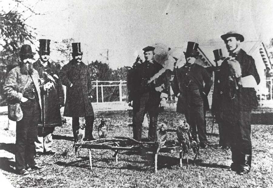 A black and white photo of falconers in Phoenix Park circa 1861